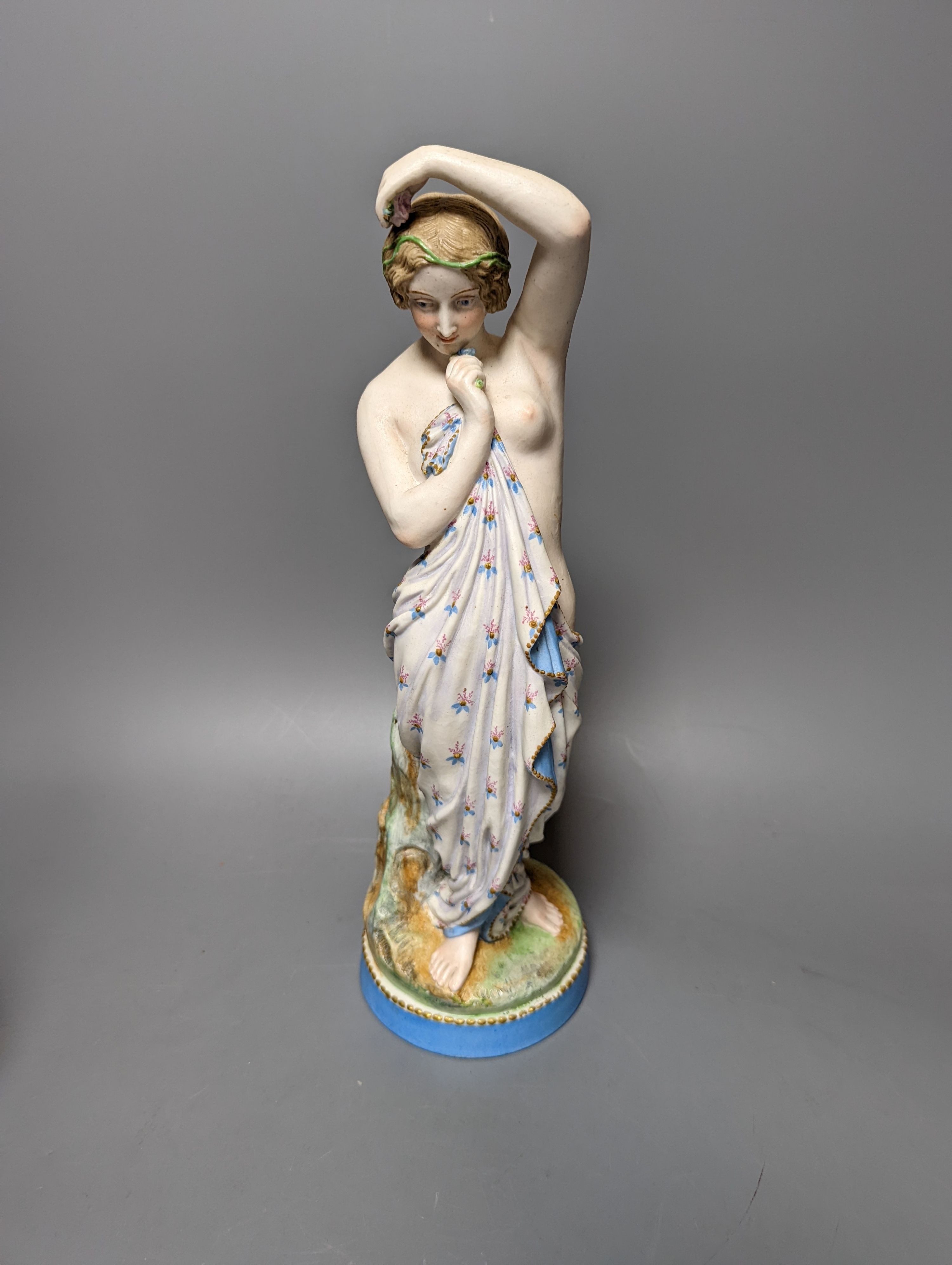 A 19th century French bisque classical female figure, Doulton Imari style teapot and a figure of an SPM porcelain figure of a Chinese man, base marked ‘SPM’. Tallest 34cm